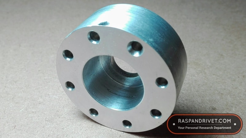 The aluminium adaptor that attaches an angle grinder hook-and-loop backing plate to a Bosch.